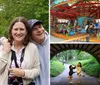 Two people are sharing a playful moment under a brick archway in a lush green park