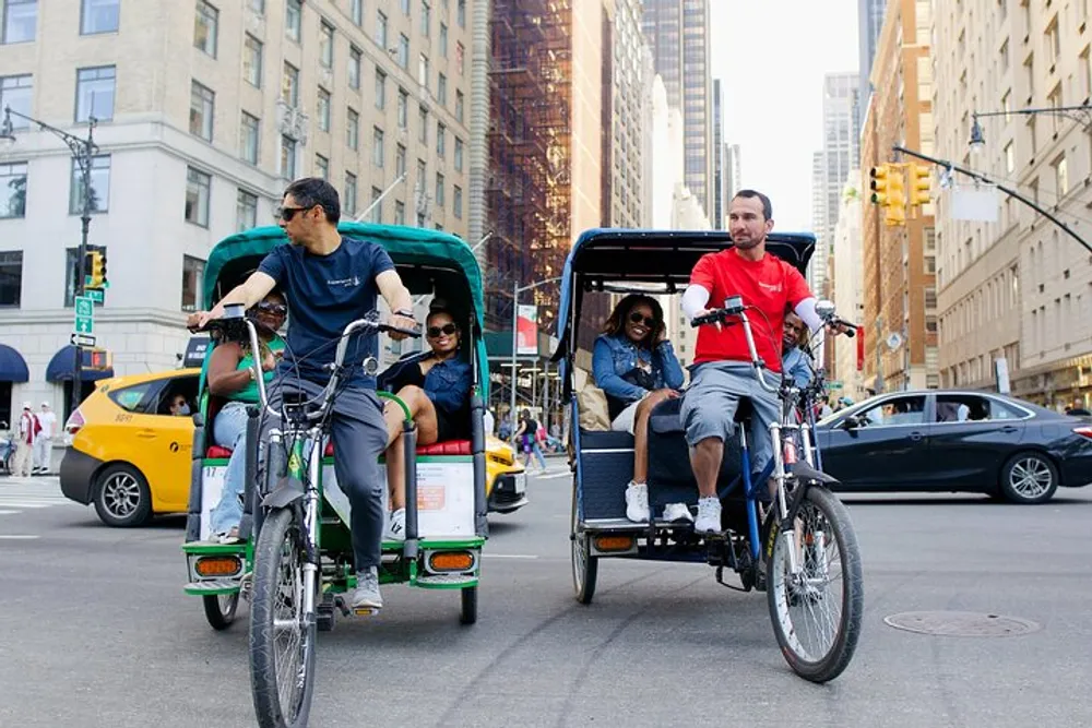Pedal-powered rickshaws carry passengers through a bustling city street