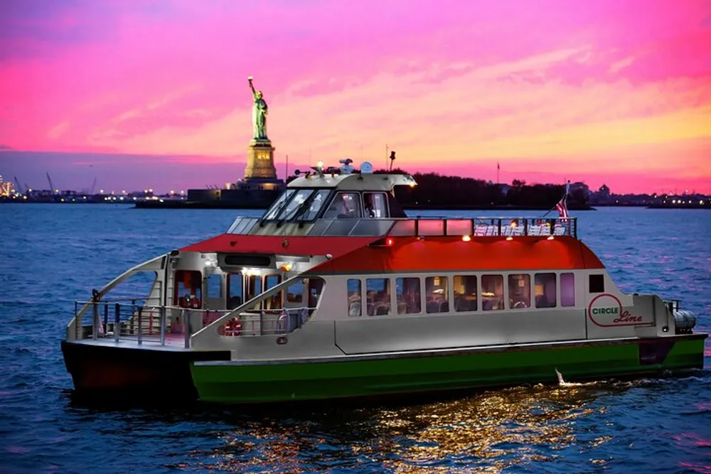 A ferry boat is cruising on the water with passengers on board against a backdrop of a pink-hued sky with the Statue of Liberty in the distance