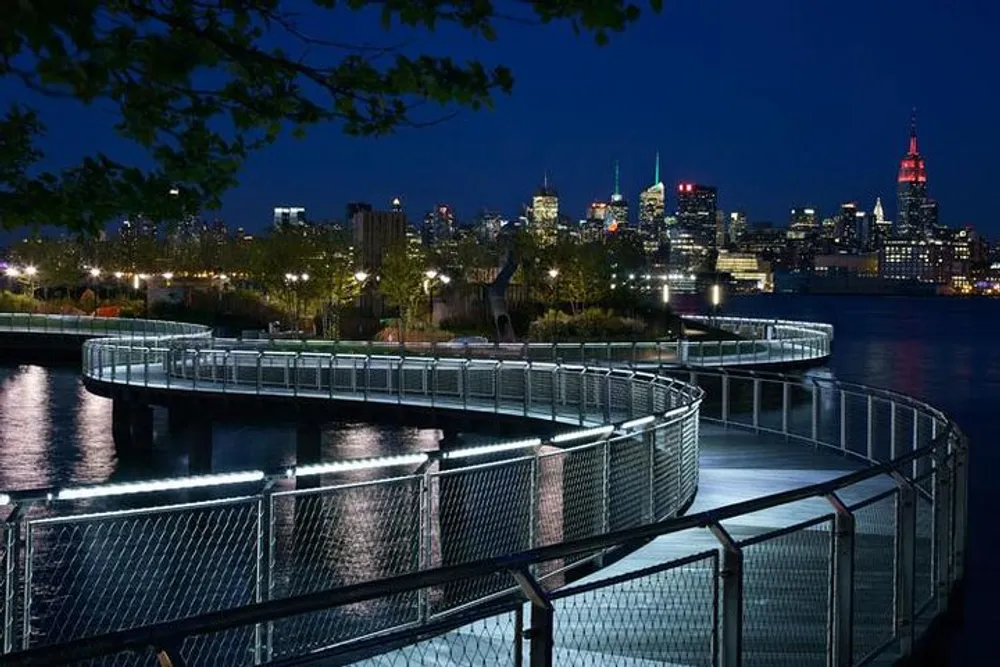 The image showcases a serpentine walkway along a waterfront at twilight with a vibrant city skyline illuminated in the background