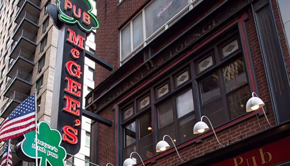 The image displays the exterior of McGees Pub with a red signage an American flag and shamrock decorations suggesting an Irish theme