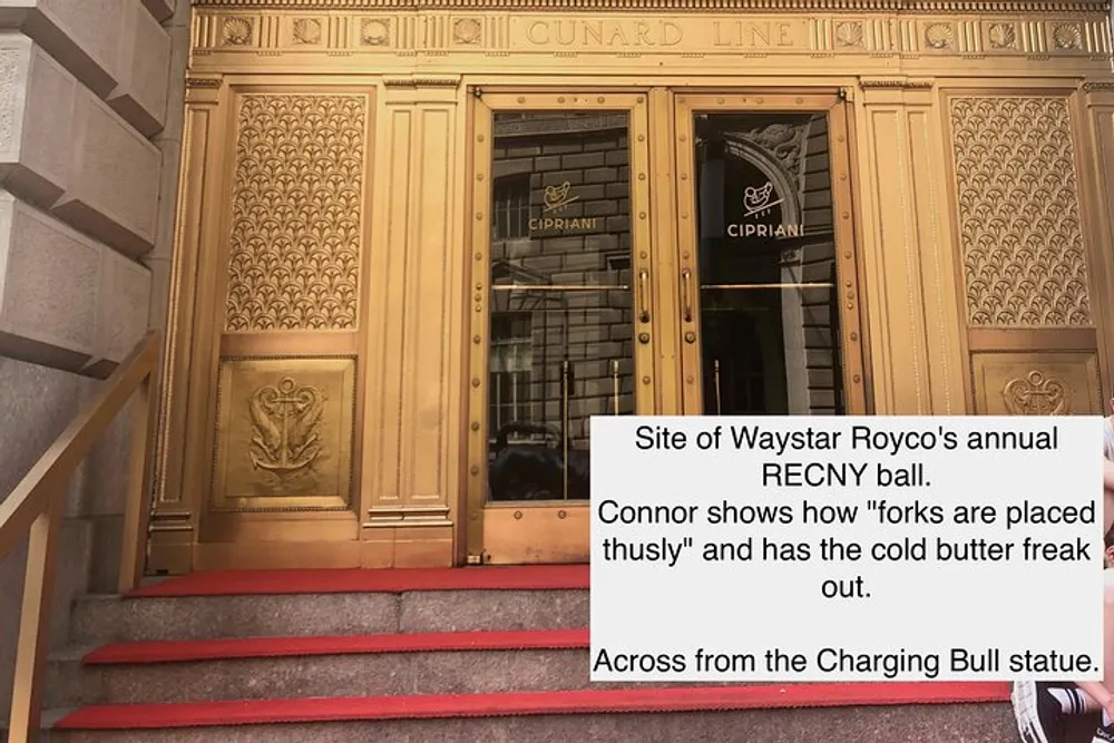 The image displays the entrance of a grand building with ornate golden doors and red carpeted steps accompanied by text boxes referencing an event a characters mannerism and a nearby landmark