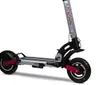 The image shows a folded electric scooter with visible branding on its frame designed for portability and urban commuting