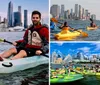 A man and a woman are kayaking in front of an urban skyline