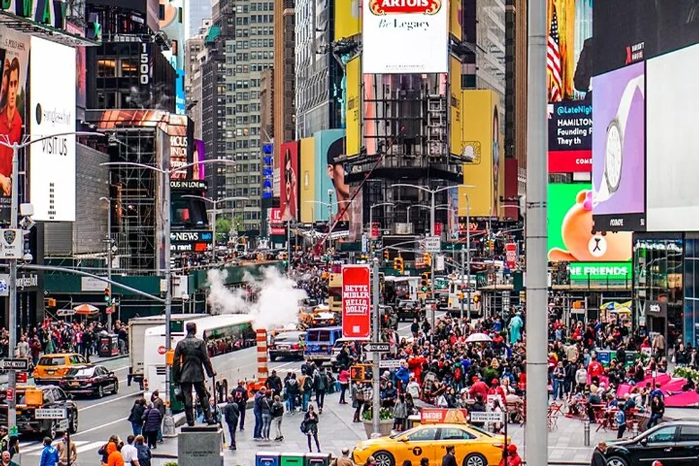 The image captures the bustling atmosphere of Times Square in New York City highlighted by vibrant advertisements dense crowds of pedestrians and the iconic yellow cabs