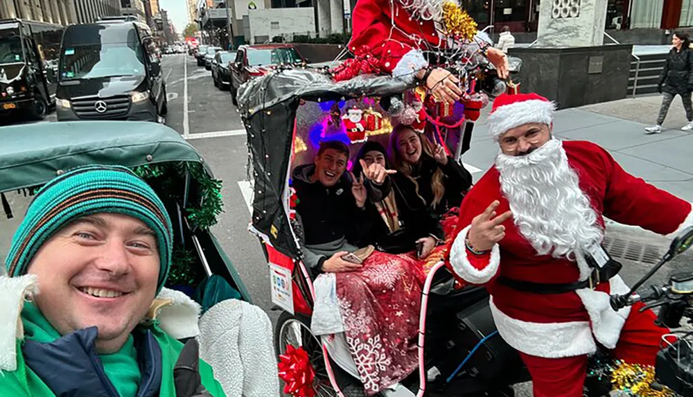 A person dressed as Santa Claus is riding a festively decorated pedicab with passengers while another person takes a selfie in the foreground set on a city street