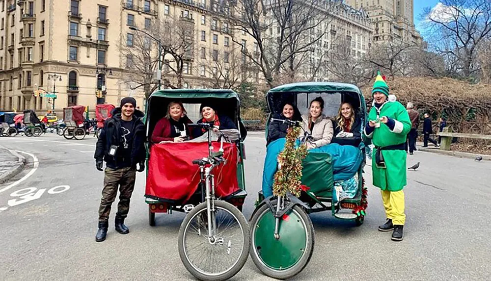 A group of people are enjoying a festive pedicab ride in an urban park setting accompanied by an individual in an elf costume