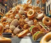 The image depicts a surreal and chaotic scene of an avalanche of oversized baked goods and snacks cascading down a city street