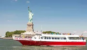 A red and white boat named 