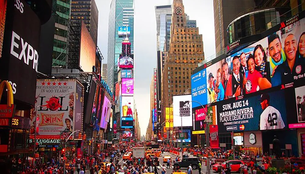 The image shows a bustling Times Square in New York City with vibrant digital billboards and busy street traffic