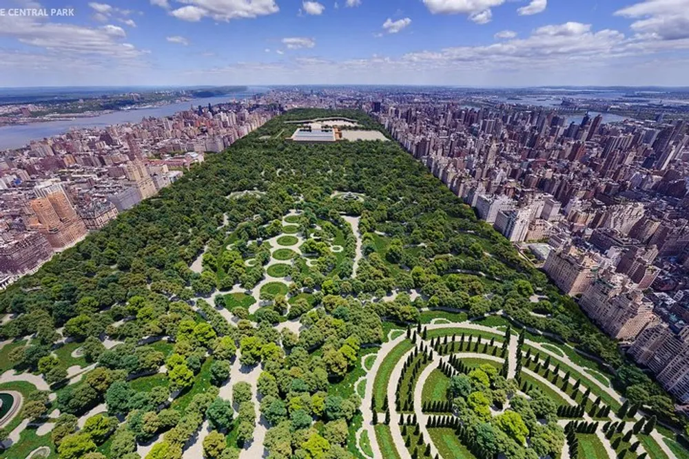 This image shows an aerial view of Central Park in New York City surrounded by the dense urban landscape of skyscrapers and buildings